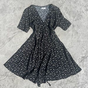 Black daisy pattern wrap around dress